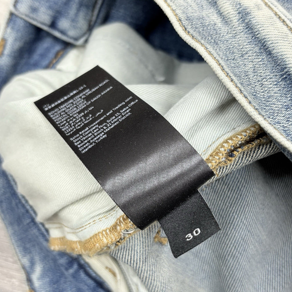 Size 30 - Amiri Suede Logo Appliqué Ripped Jeans ' Blue ' | BRAND NEW!
