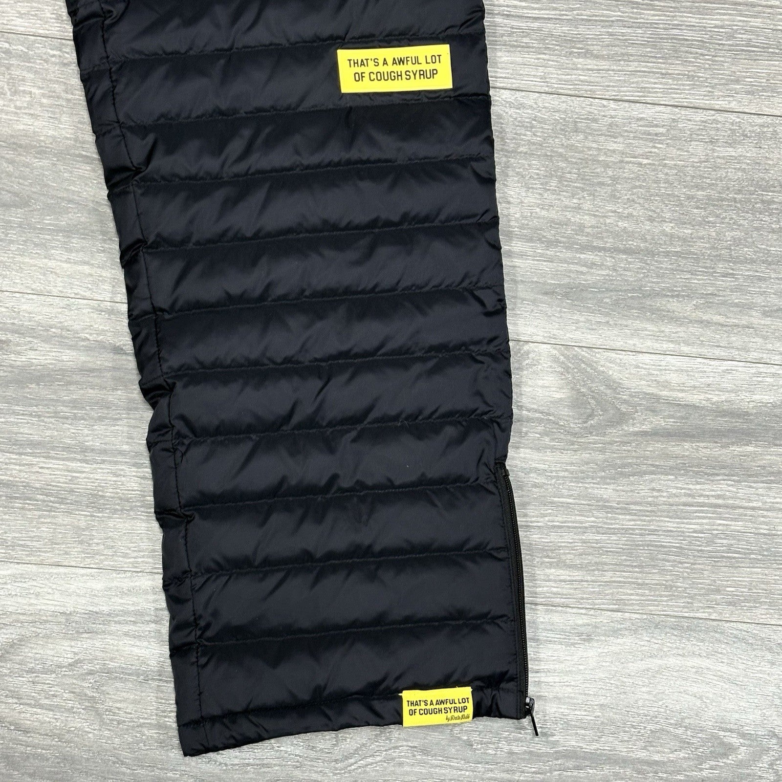 Size L - Thats A Awful Lot Of Cough Syrup Puffer Flare Pants ' Black ' | NEW!