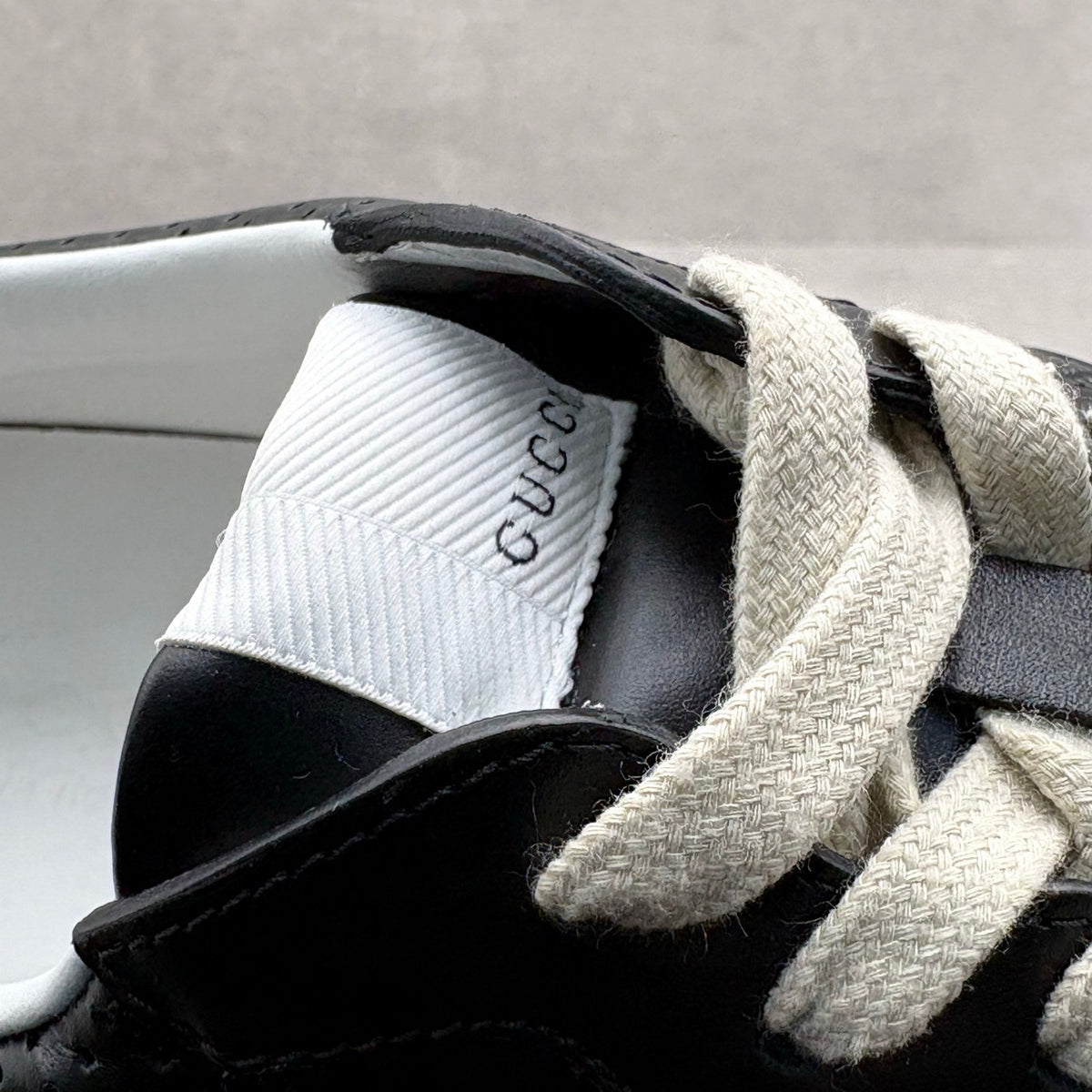 GG Embossed Leather Sneaker Black — photo 11